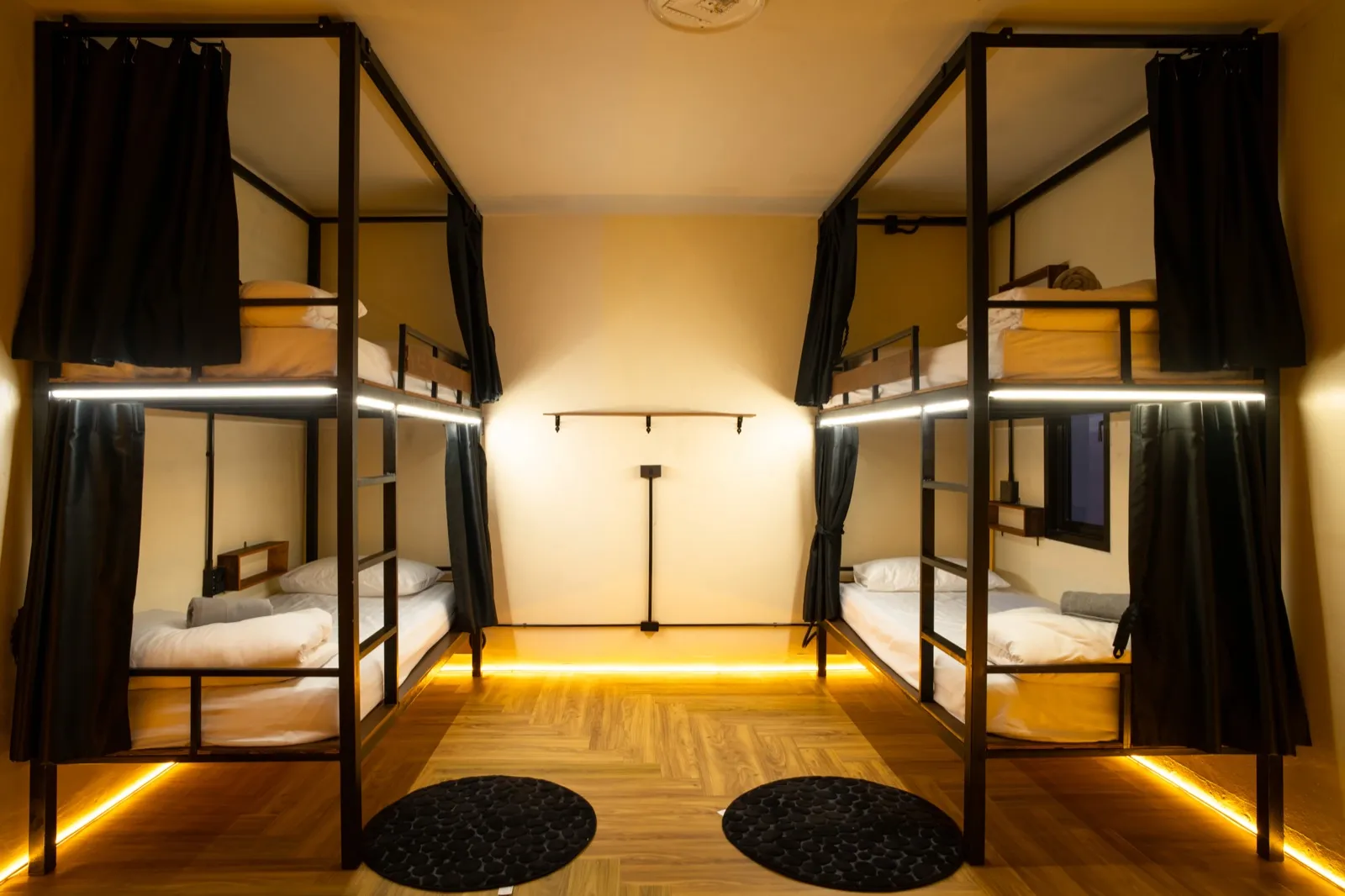 Bright 4-bed dorm with single beds at the cannabis-friendly hostel in Ao Nang Beach